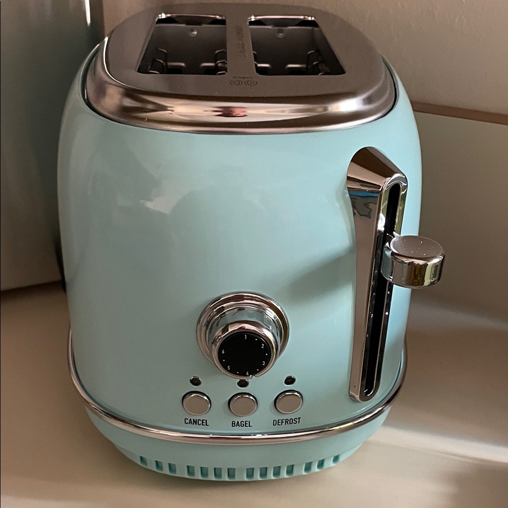 Retro Turquoise Toaster with Chrome Accents